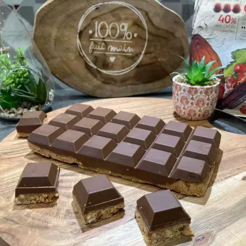 "Delicious homemade gourmet peanut butter squares, beautifully arranged on a rustic wooden surface showcasing attempting an indulgent treat we can't wait to try!"